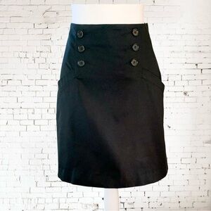 H&M short black skirt with pockets and decorative buttons